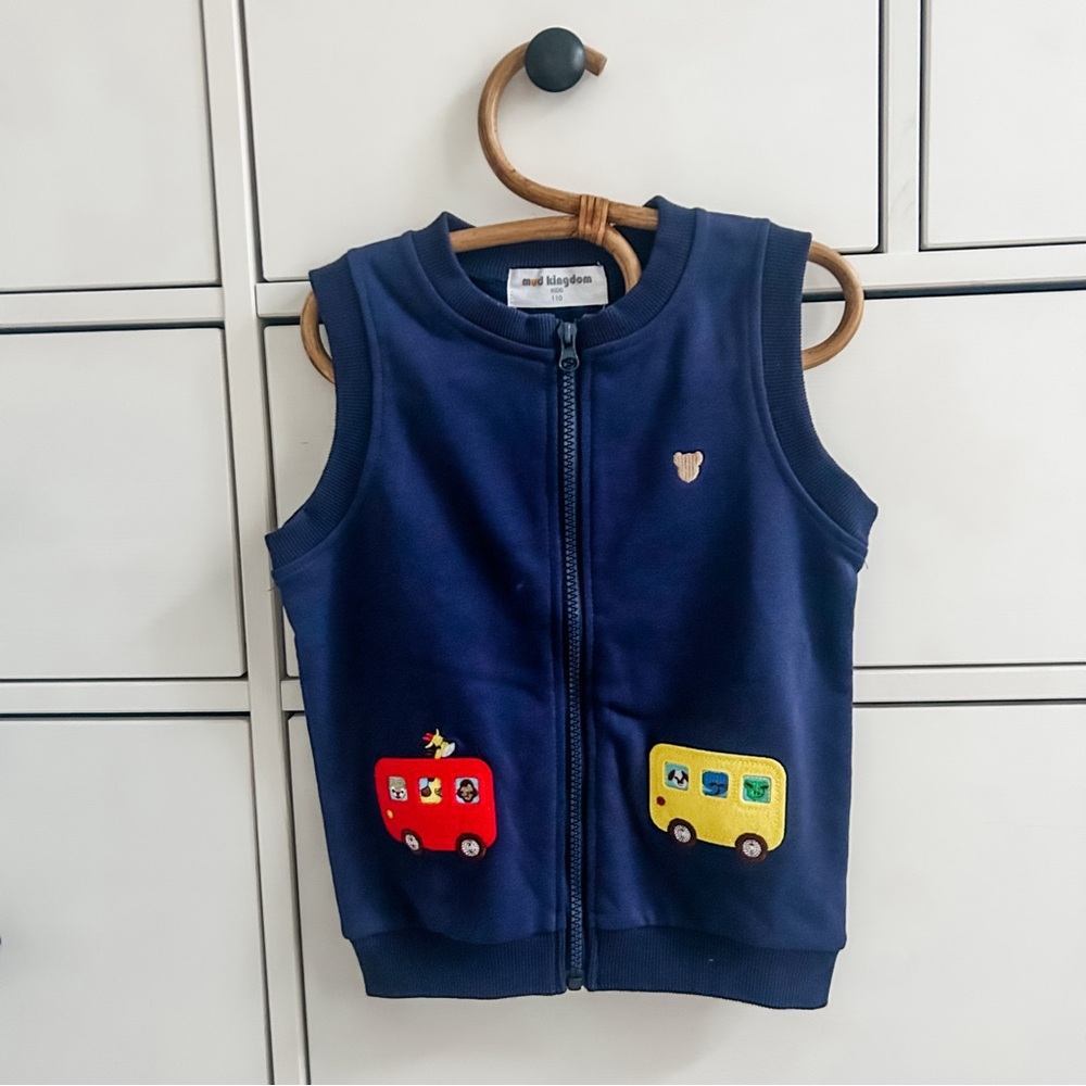 Navy blue zip-up vest with embroidered design #kidswear